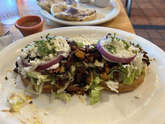 Sopes Al Pastor with the spicy hot sauce