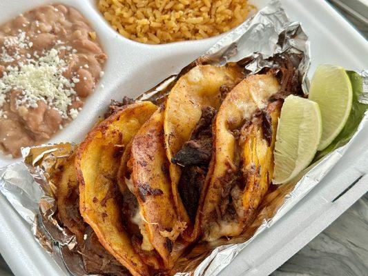 Steak Birria Tacos with rice and beans