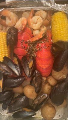 Maine Lobsterman's catch.  2 trays for 4 people.