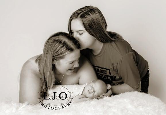 maternity and newborn photography with sister with brother with sibling