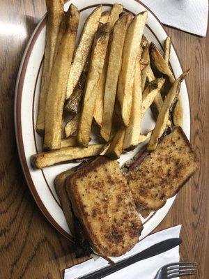 Rueben sandwich with homemade fries.