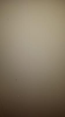 Picture of damage to my ceiling done by Joe Byrne's tech that he refuses to pay for.