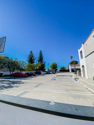 Free parking available behind our building in this small lot (entrance on Nestle Ave).