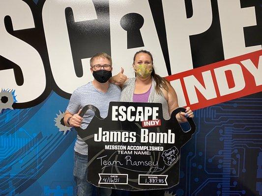 Husband and I with the Escape Indy sign!