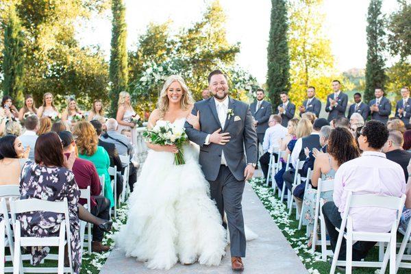 Happy newlyweds at Vellano by Wedgewood Weddings in Chino Hills