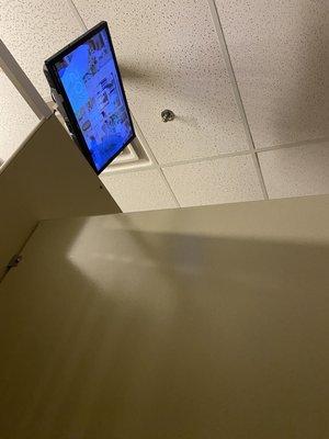 Tv in bathroom stall