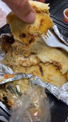 Pupusas, look at the melted cheese yummmm