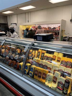 Deli area!  One working and three talking. The lines grows!