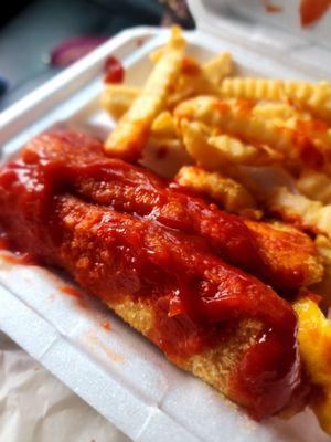 Hot fish with ketchup and hot sauce