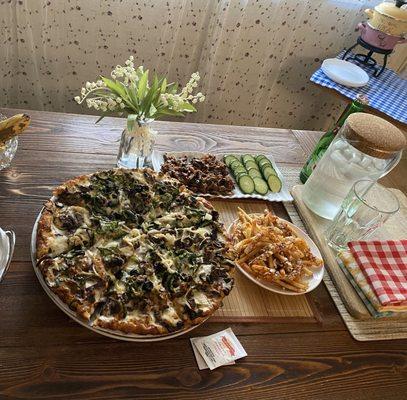 Pizza, Greek Fries, Side Dolma & Eggplant Salad.