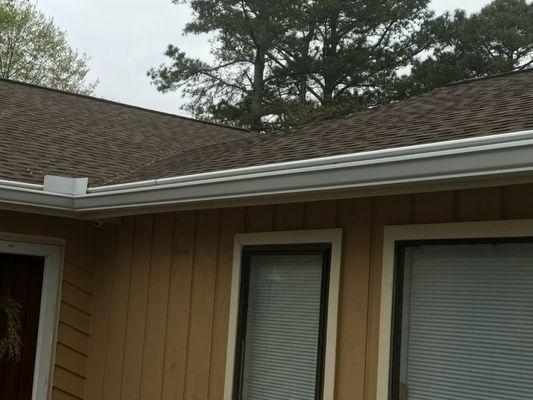 Gutters with gutter guards.