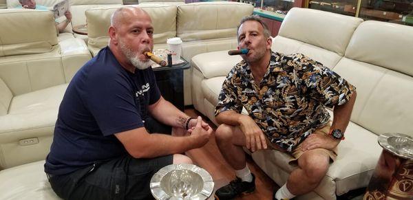 Two Longshore workers enjoying Camacho cigars. We're taking a break from the heatwave!  *7/17/19*