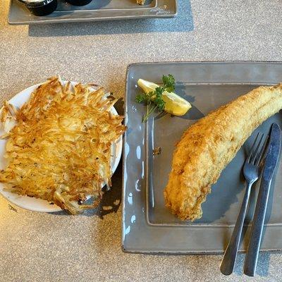 Canadian walleye dinner with hash browns