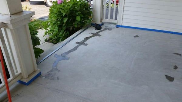 This patio was severely cracked and required staples to be installed before decorative coating applied.