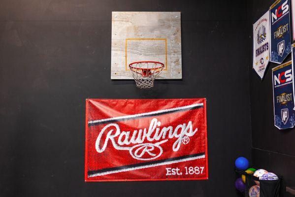 While your not hitting in the cages, shoot some hoops on the indoor basketball hoop.