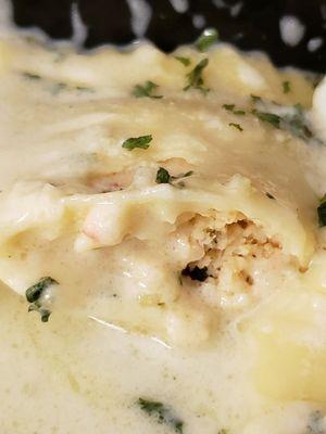 This is the inside of the Seafood Ravioli with Alfredo sauce.