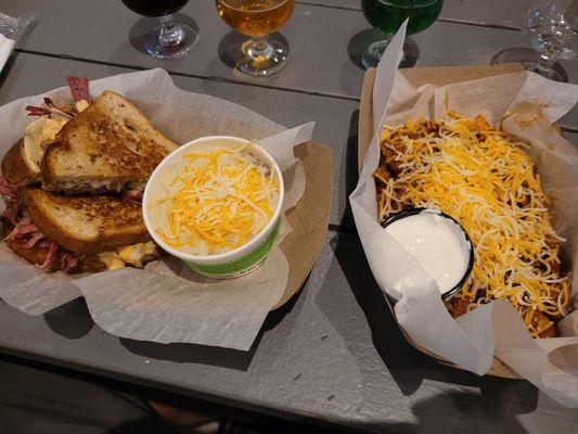 The food from the food truck outside. Grilled cheese with Elote chowder and Frito Pie.