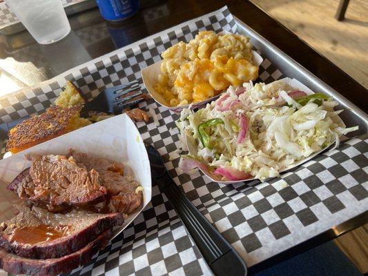 Brisket, mac n cheese slaw and corn bread just delishhhhh! This place is a hidden gem!!!!! Best meal I've had in this town!!!!