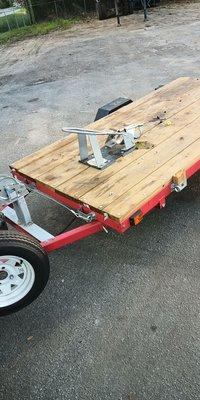 Mangled wheel chock and broken 2x4 ramp support