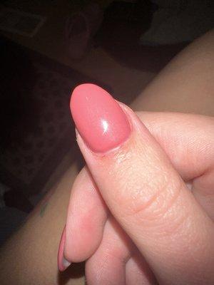 Nail polish all over my finger that the nail tech got aggravated about me asking her to take off. Worst shape ever!