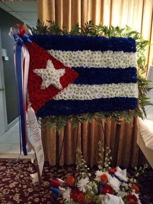 Custom flags funeral arrangement