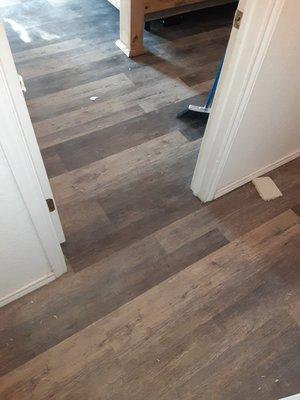 Had to match up existing hallway floor with new bedroom floor and make it all lock together with no threshold and successful