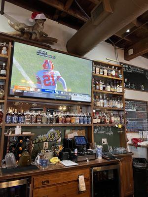 The big tv at the bar and more whiskey.