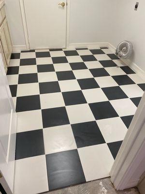 Laundry Room with 12"x12" Retro Black and White tile.