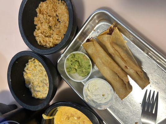 Chicken flautas, rice, elote and queso