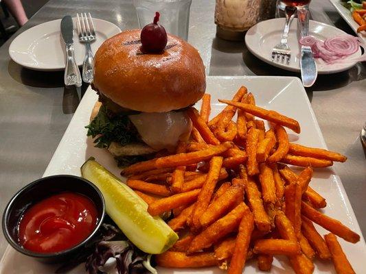 Gruyère cheeseburger special with sweet potato fries.