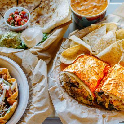 Flavorful burritos, quesadillas and salads are all made with freshly prepared, in-house ingredients like hand-smashed guacamo...