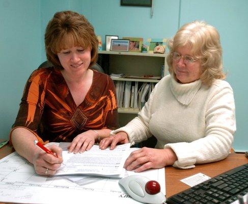 Karen & Wendy working hard!