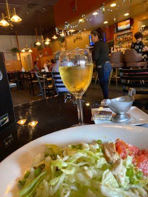 Clos de Bois Chard with my salad and the sweet waitress/manager? helping other customers