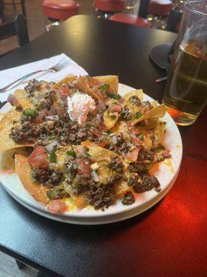 The nachos are fire today!!! Give the girl in the kitchen a fucking raise!!!!