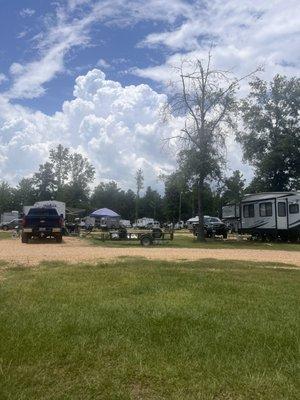 Trucks, trailers and golf carts parked everywhere. Even in other people's spots.