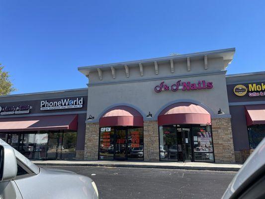 Outside!!!! Sign blew away from storm but next door to the Nail Shop!!