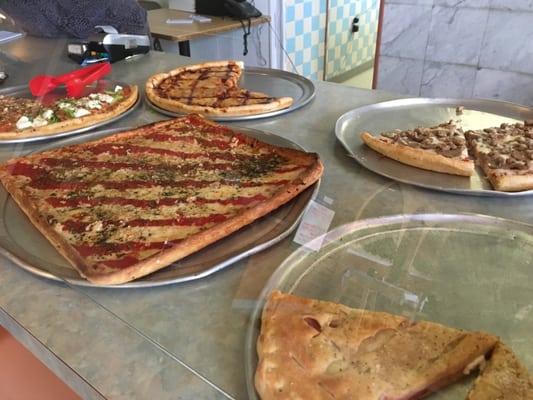 Sicilian style pizza, Stromboli, stuffed pizza, and more by the slice