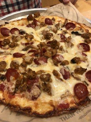 Sausage, pepperoni, mushroom pizza