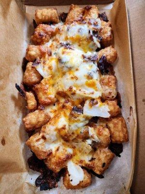 Philly Cheesesteak Loaded Tots with no green peppers.  It has a very satisfying balance between tots and toppings.