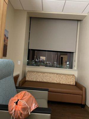 Picture Window with a Couch, Recliner and Desk