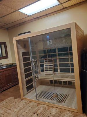 The infrared sauna is in a private room. Complete with Bluetooth speakers and bamboo lumbar support.