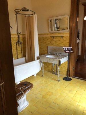 Love the pop of this yellow tile. I would not be brave enough to do this to my master bath but love it!