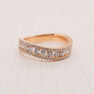 Simple rose gold wedding band with diamonds