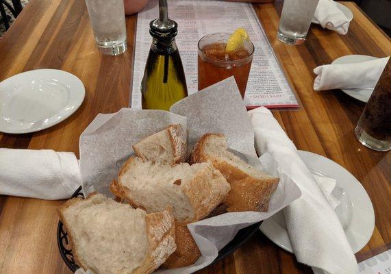 Complimentary bread basket and olive oil