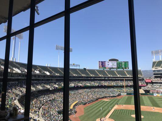 Floor to ceiling windows at Shibe Park Tavern at the Oakland Coliseum in Oakland.