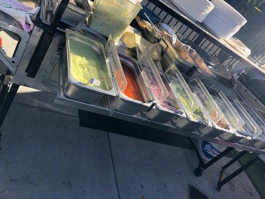 Salsa, condiments bar.