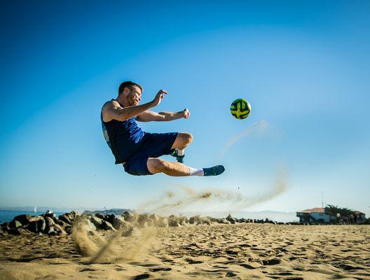 Soccer workout at the beach.