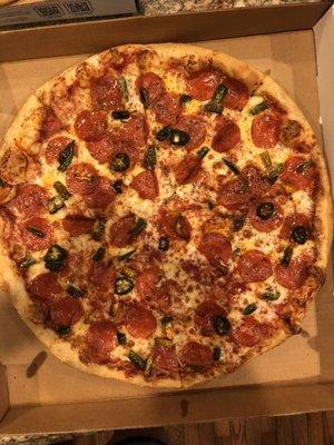 Pepperoni and spicy peppers pizza.