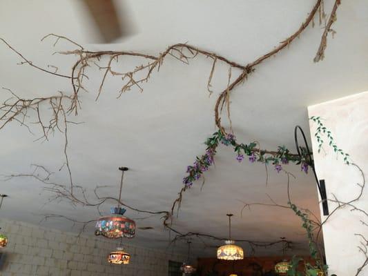 The tacky vine decor is covered in clumps of dust that could fall in your plate at any time! Yuck