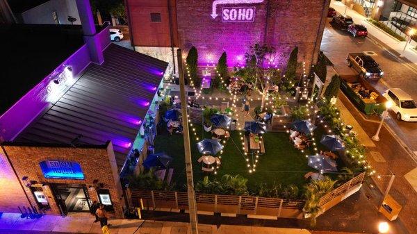 DOWNTOWN SOCIAL HOUSE EXTENDED GARDEN AT NIGHT